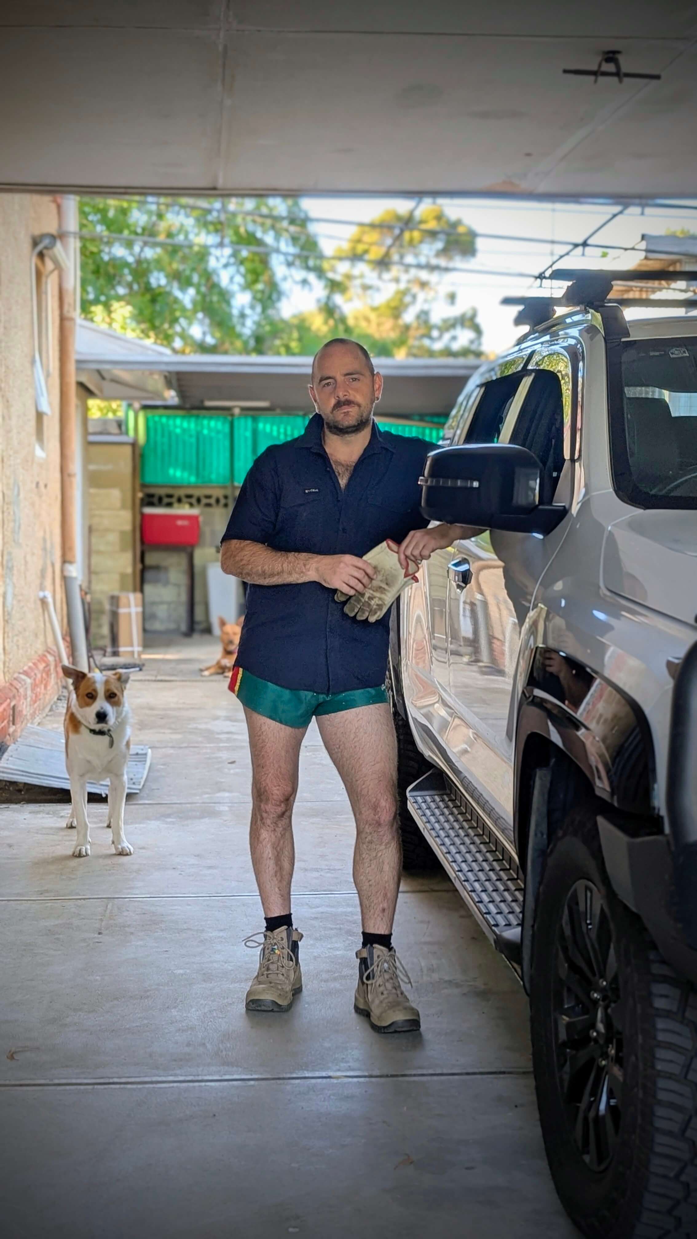 Aaron working in carport